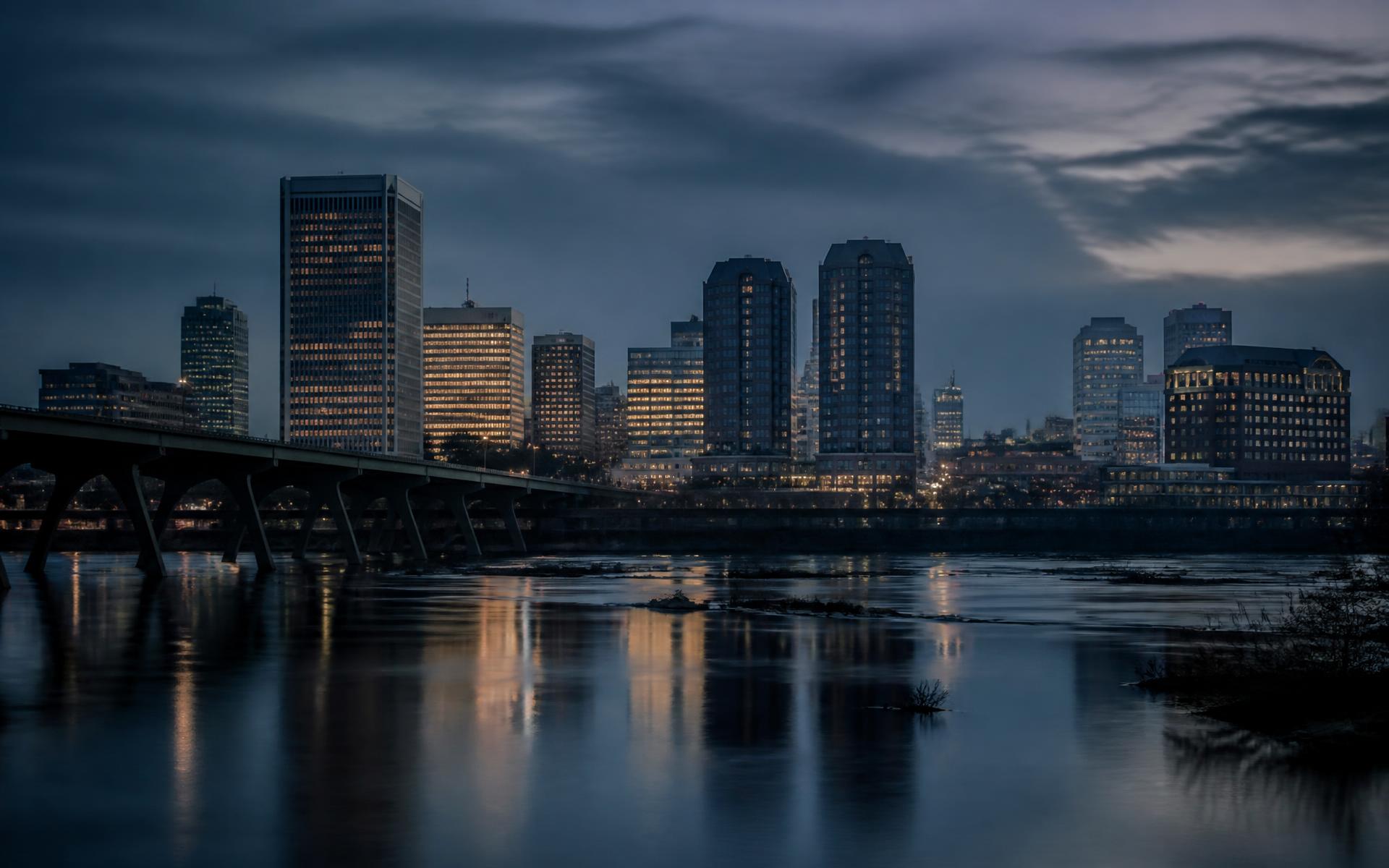 The Richmond, Virginia skyline at dusk across the James River